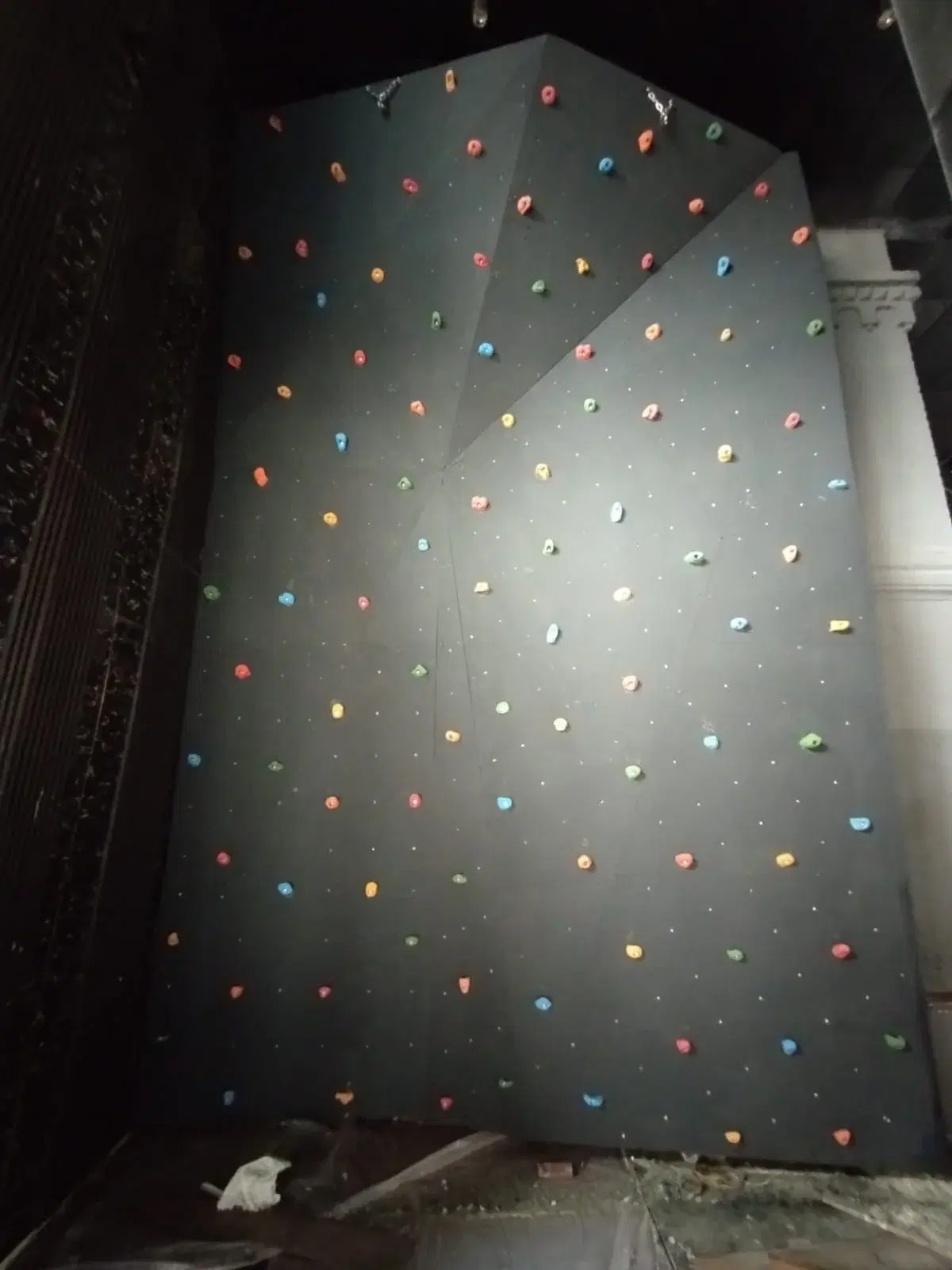 Climbing wall with colored holds at MMA Matrix Gym, Amritsar