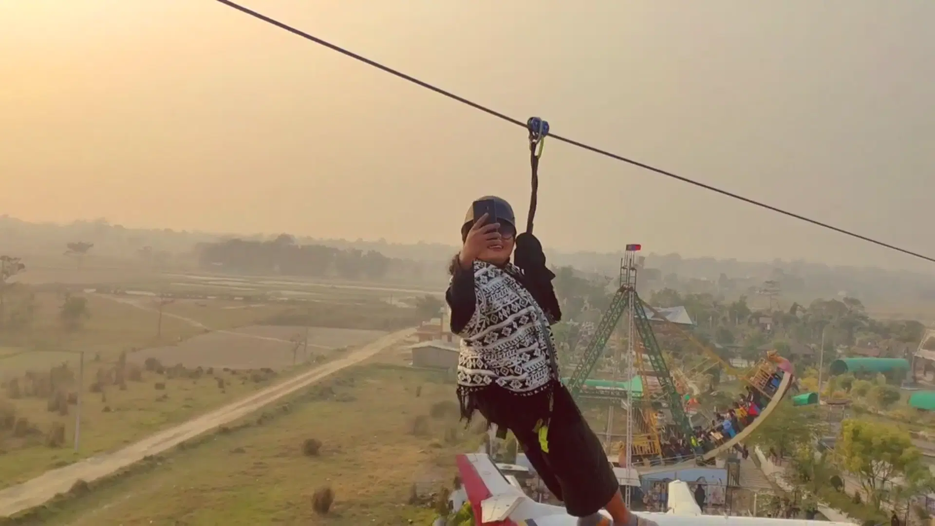Happyland Adventure Park zipline with visitors, Nepal