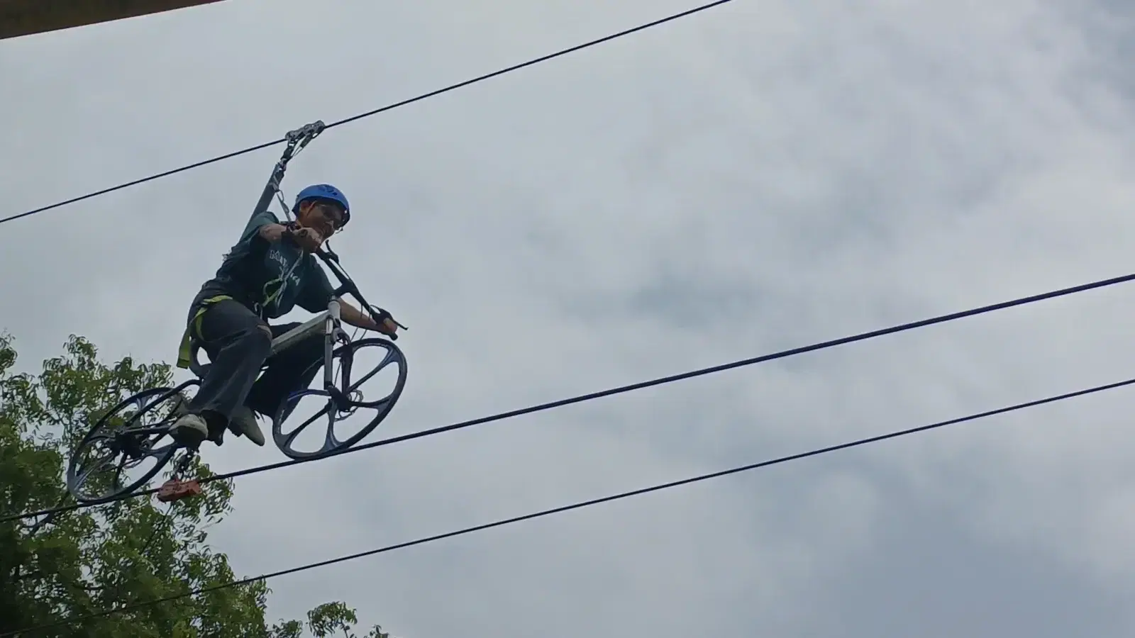 Sky cycle rider on the cable at Roadies Rostel