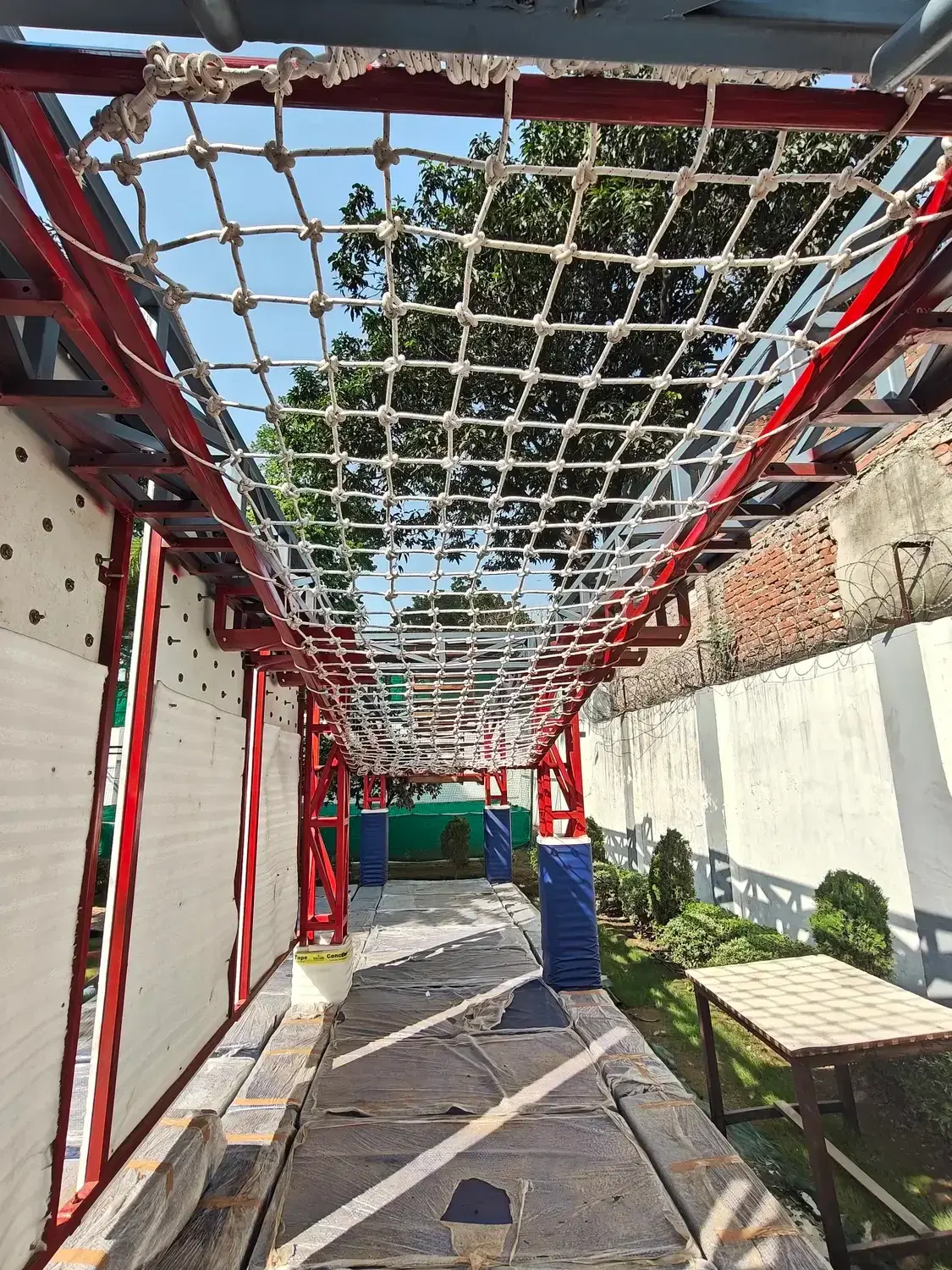 Net tunnel element on the Trishul ropes course