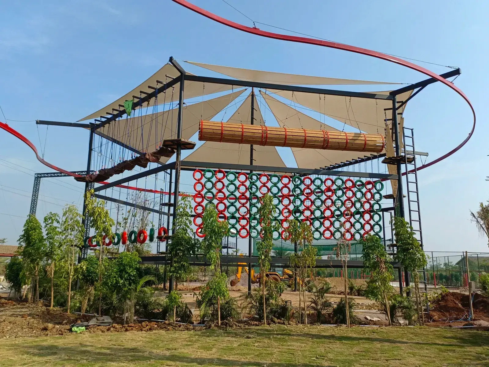 Kids obstacle zone with shade canopy at Maira Resort adventure park