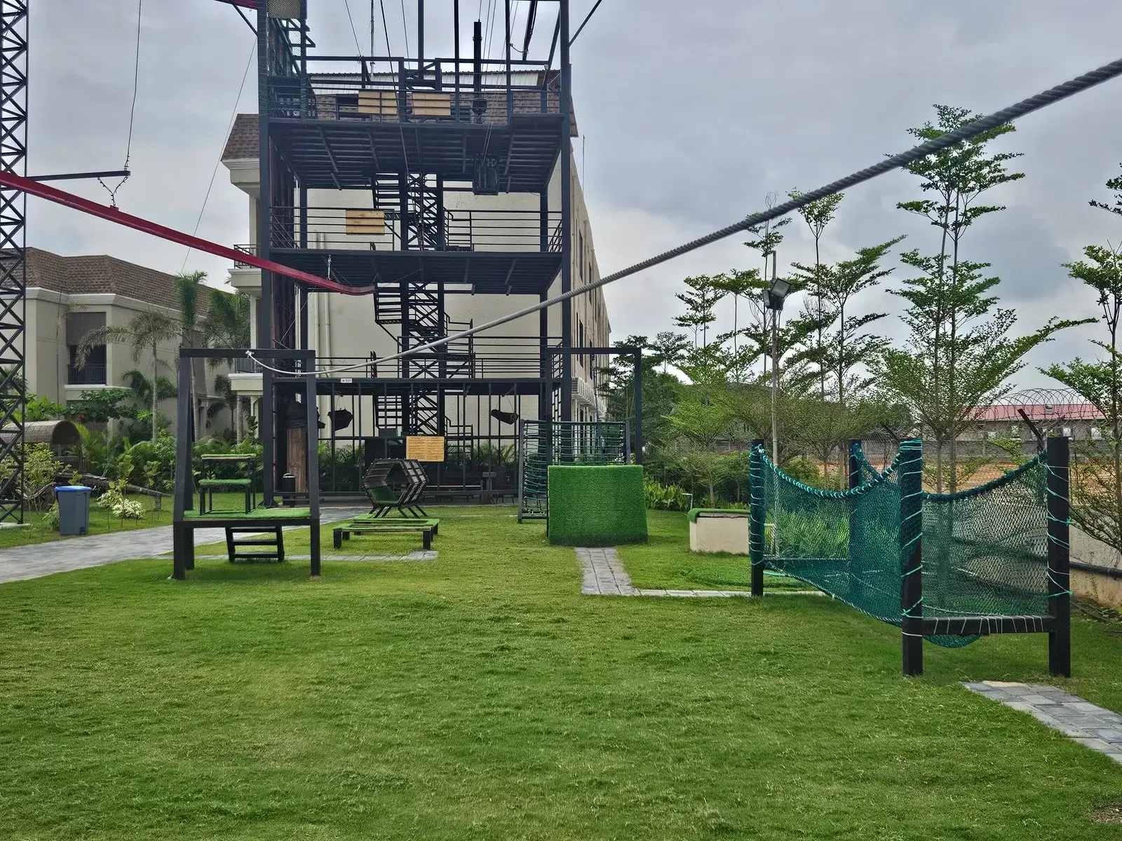 Multi-activity tower at Maira Resort Raipur — zipline, sky cycle and quick jump on one foundation