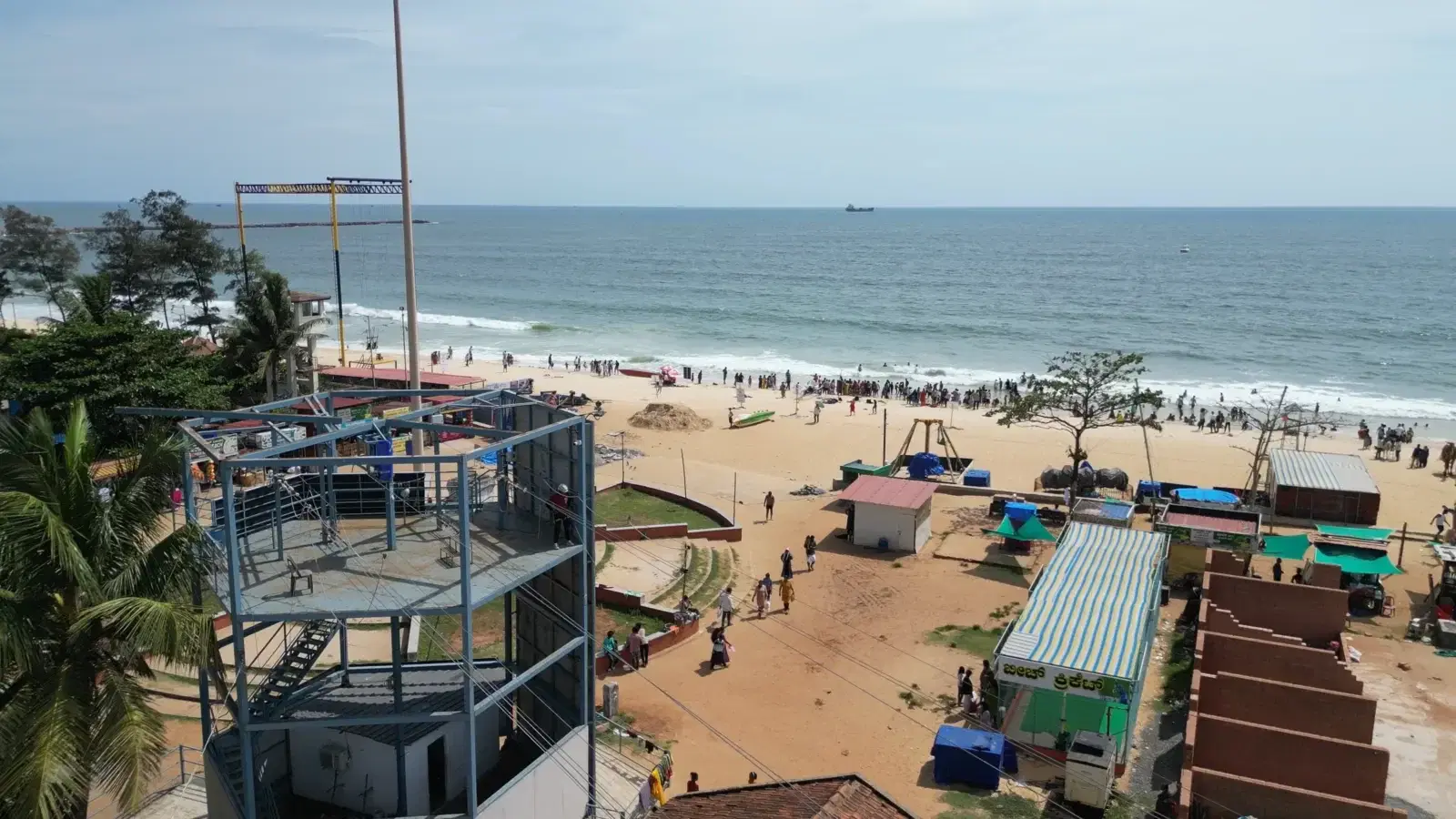 Multi-activity tower standing on beach sand at Panambur, Mangalore