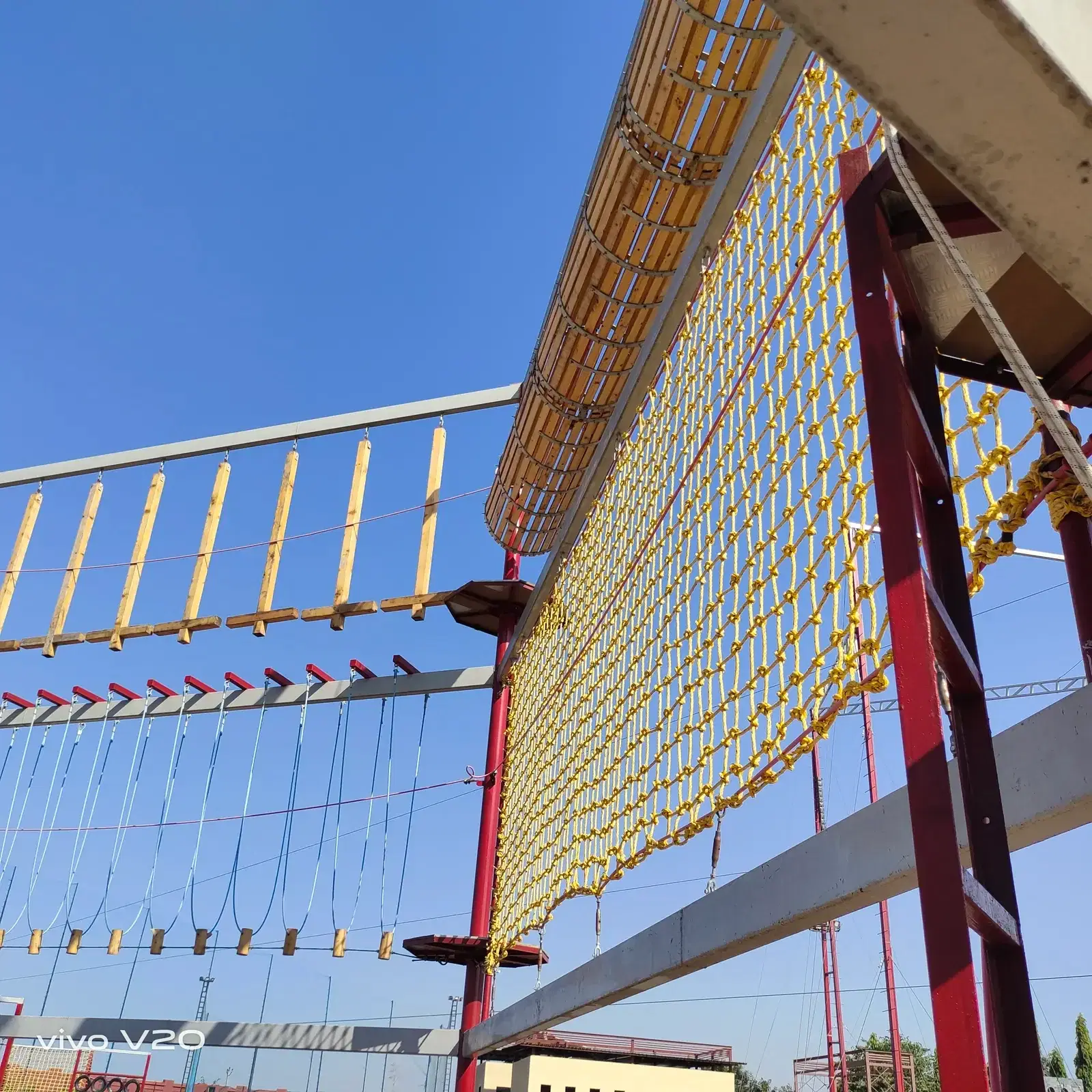 Ropes course netting detail at Prabhu Farms, Rajkot