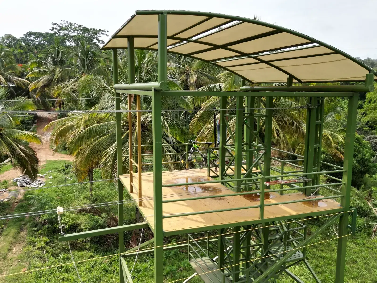 Sky cycle launch platform with canopy roof at Vasnudaraa Farms