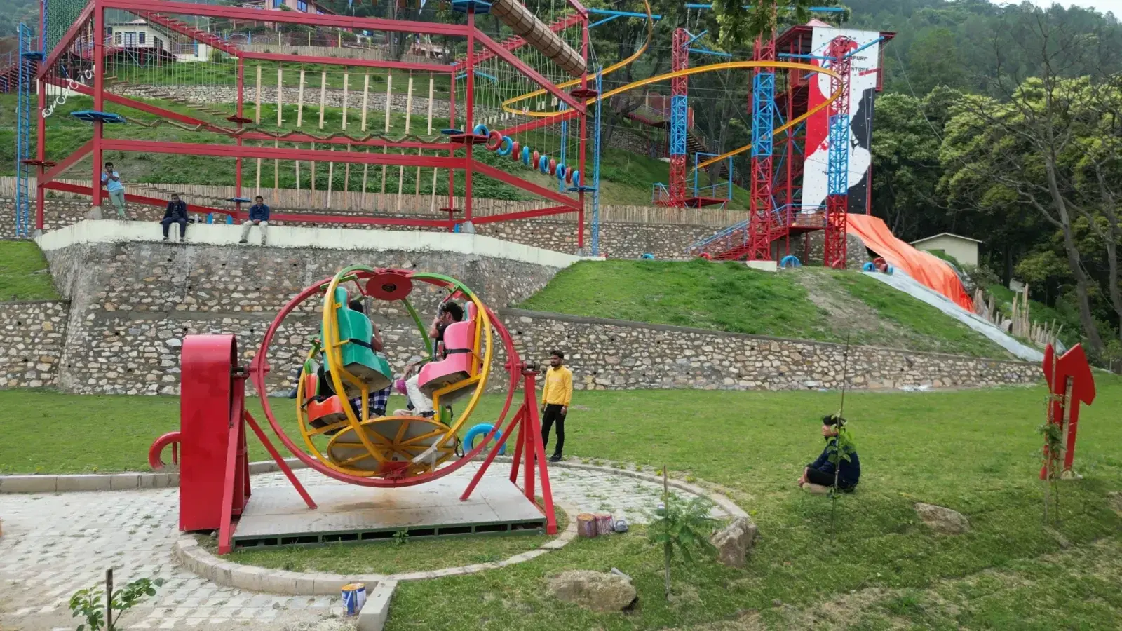 Riders on the 360 cycle at the Choudhary Group park, Kathmandu