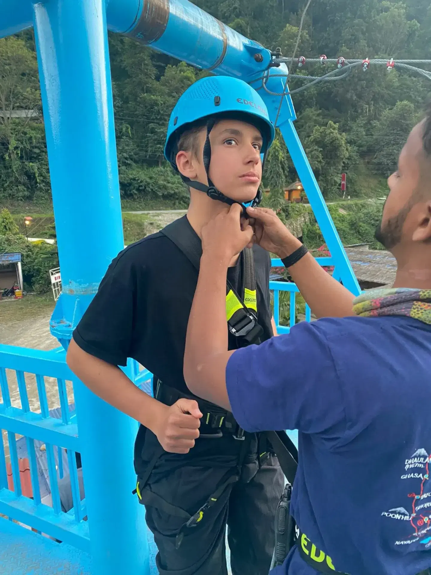 Harness safety check before the zipline ride at Trishuli