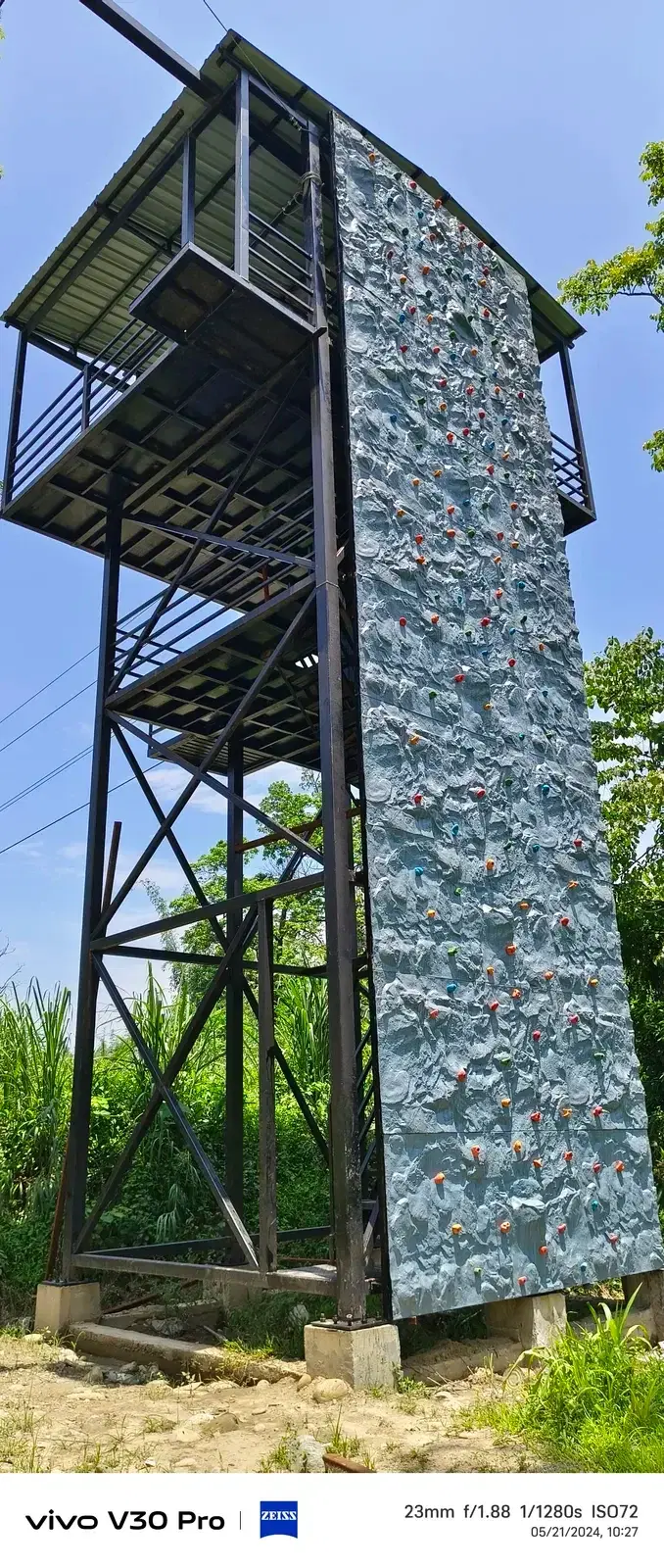 Rock-textured tower column detail at Miao WRD park