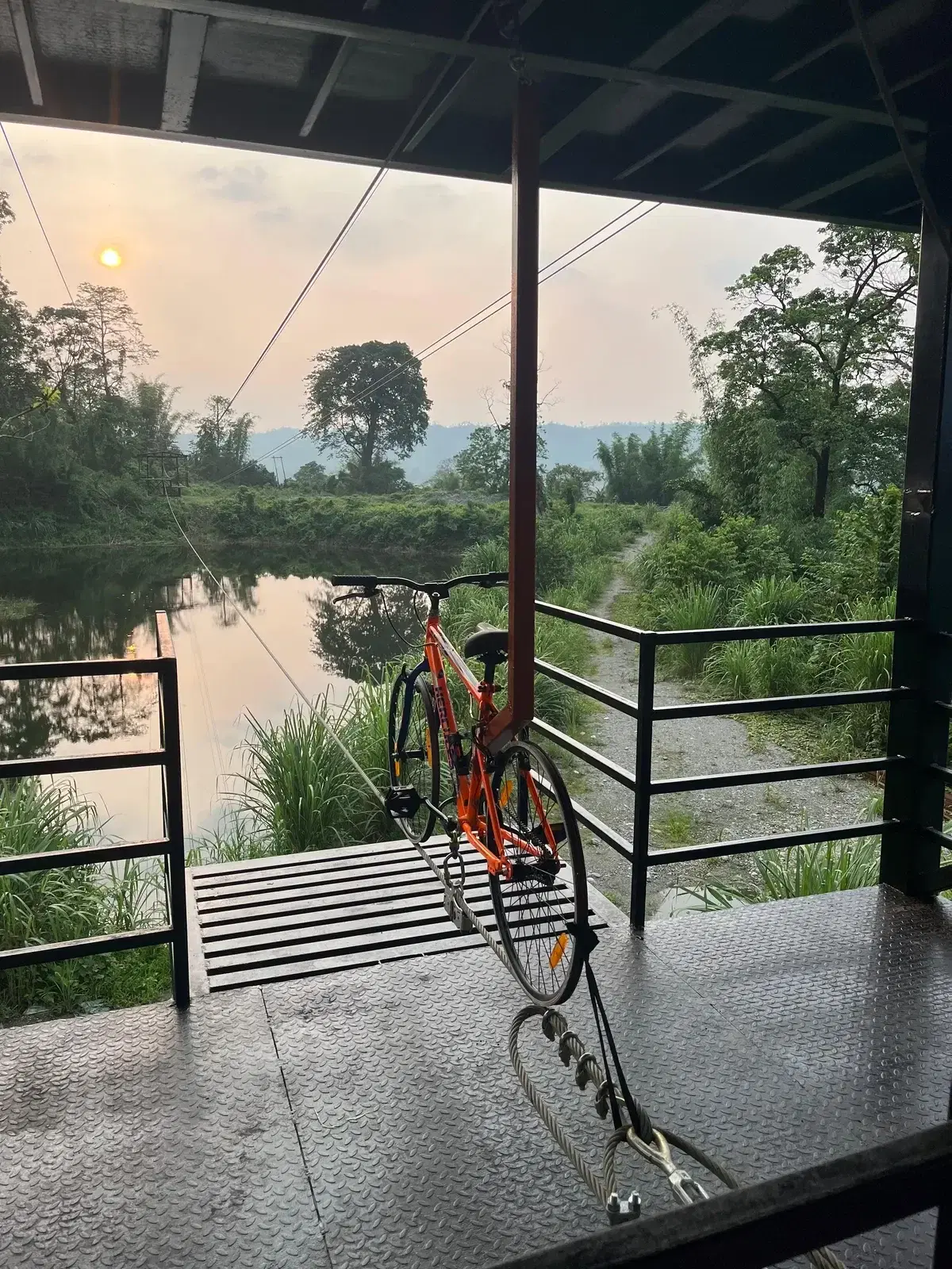 Sky cycle platform overlooking the river at Miao WRD adventure park