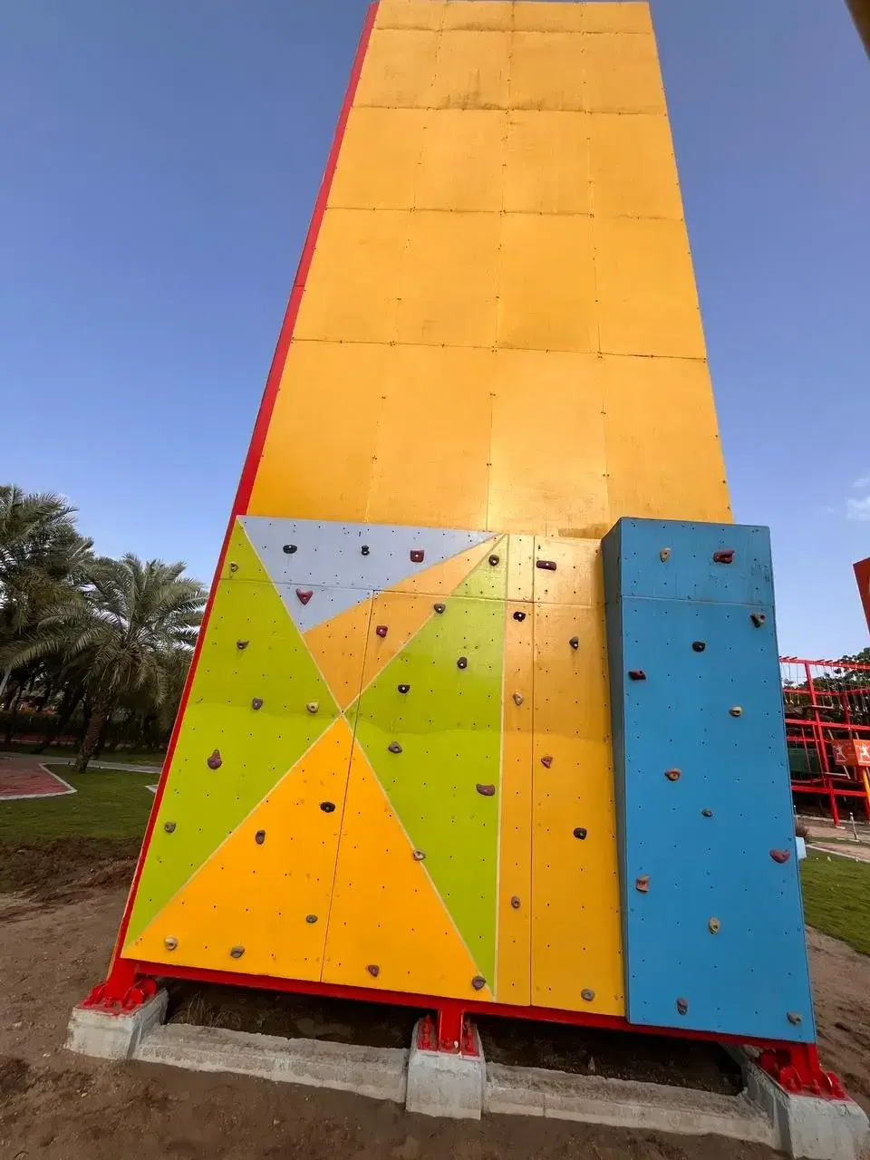 Climbing tower with auto belay and colorful kids climbing wall at Adani Mundra