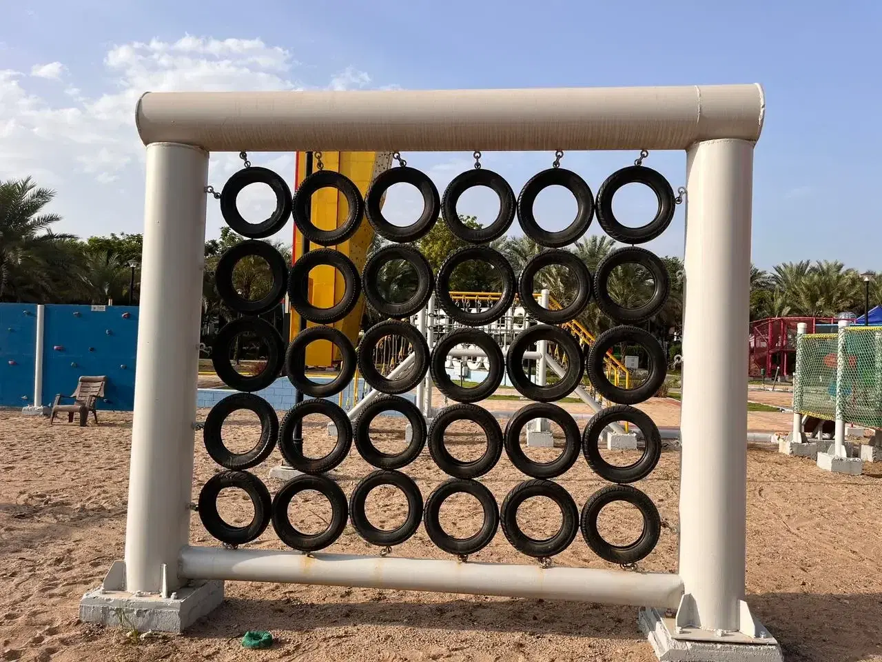 Tyre wall element of the 12-element kids obstacle course at Adani Mundra