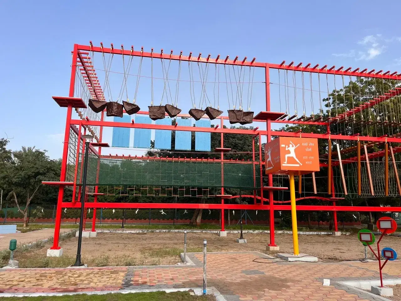 Ropes course structure with continuous belay line at Adani Mundra adventure zone