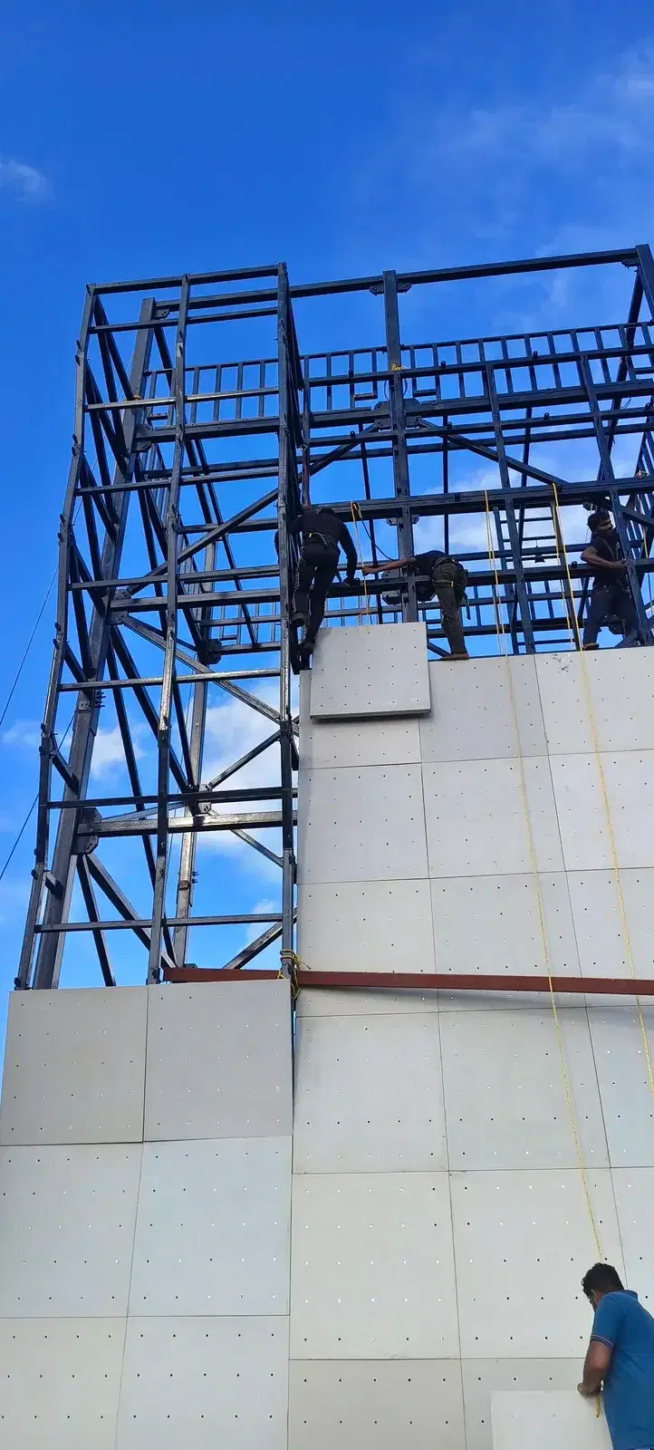 Climbing panels being installed on the ITBP wall at Khurda