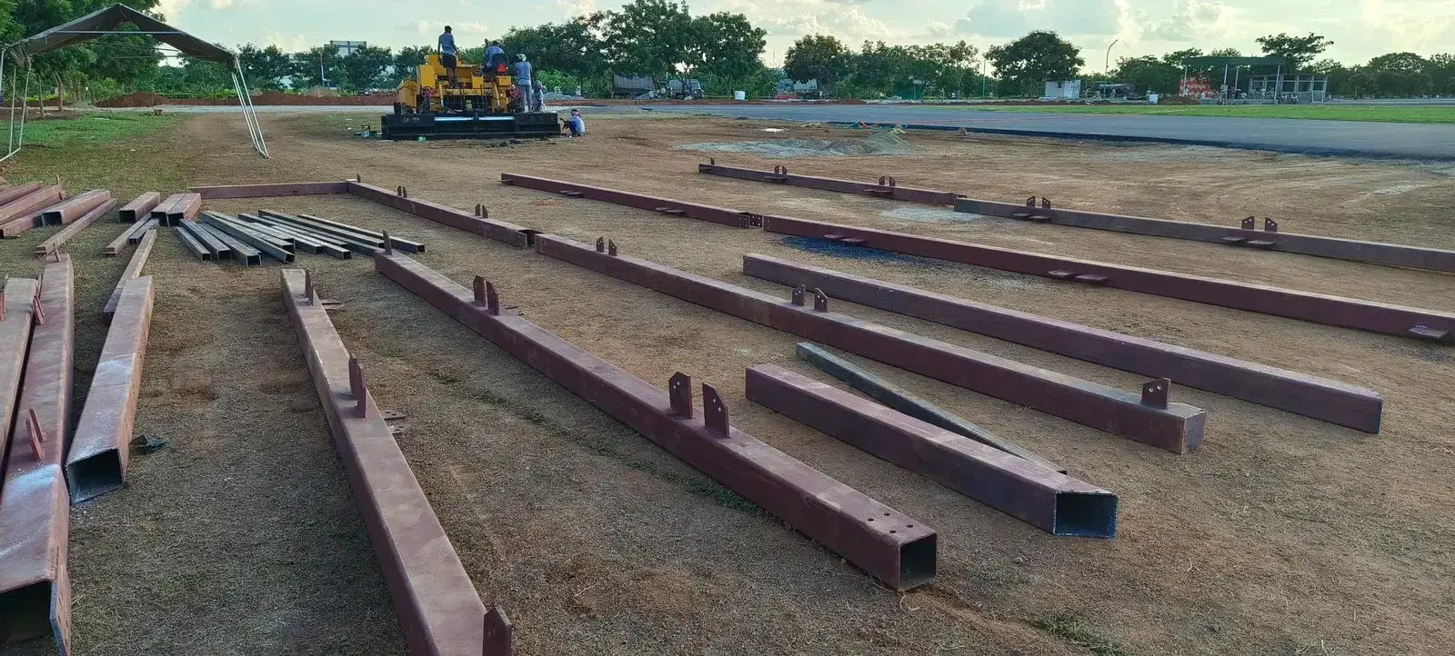 Steel members laid out for the ITBP relocatable climbing wall, Khurda