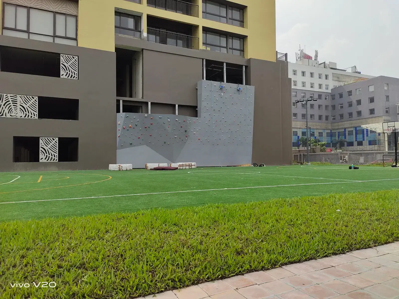 Climbing wall integrated into the residential block at Utalika, Kolkata