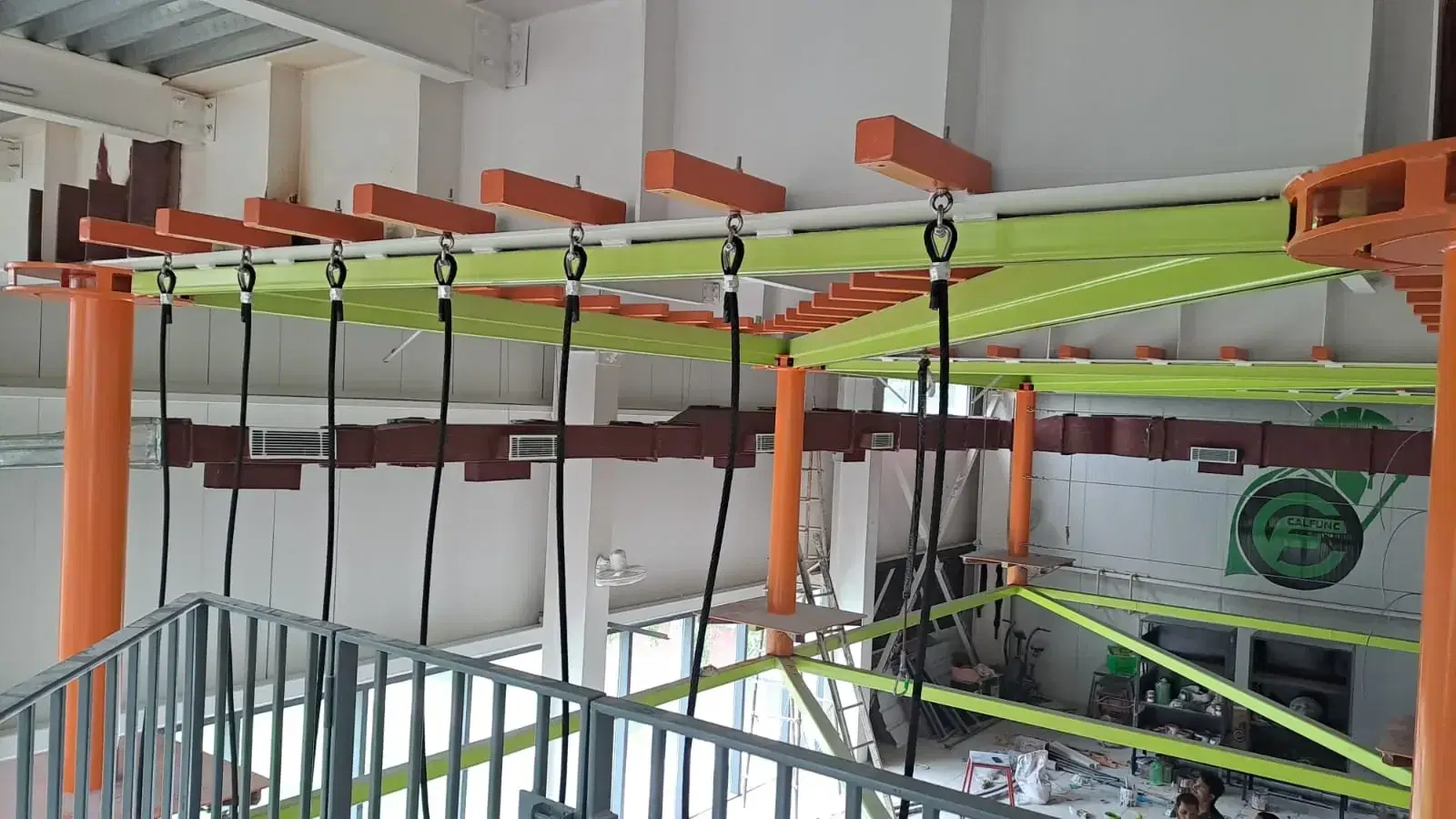 Hanging rings element on the suspended ropes course at Climb Central