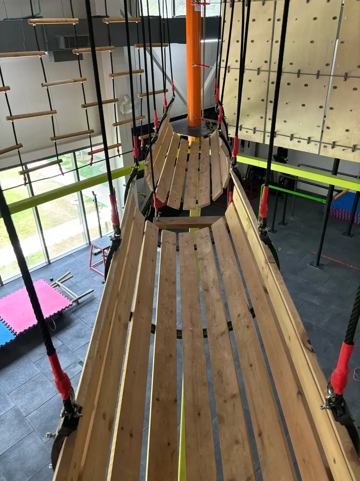 Log balance element seen from above on the Climb Central ropes course