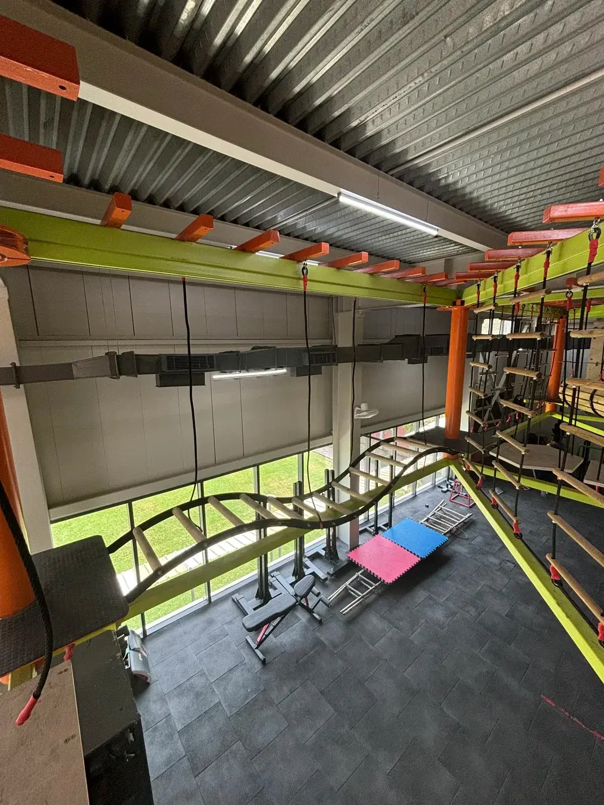 Wide view of the suspended ropes course structure inside Delhi’s biggest climbing gym