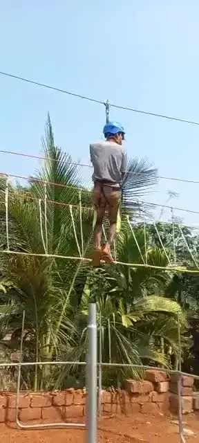 Zipline rider at Caniggia Farms, Goa
