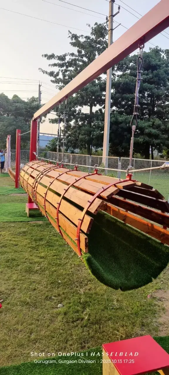 Wooden crawl tunnel element on the Swadhyay obstacle course