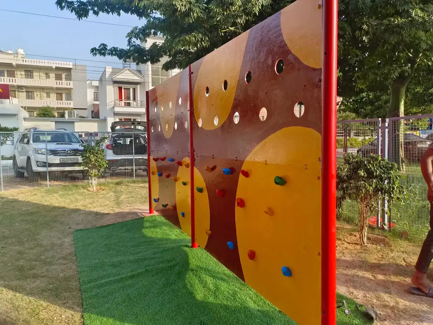 Toddler climbing panel with hand holds at Swadhyay School