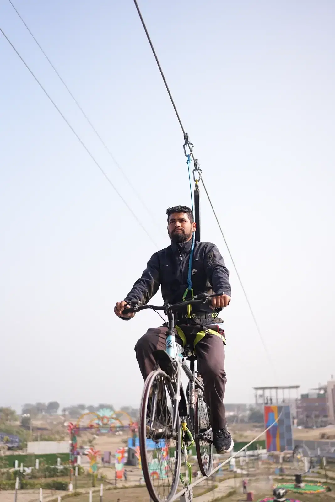 Sky cycle rider on the cable above JSR Park, Gorakhpur