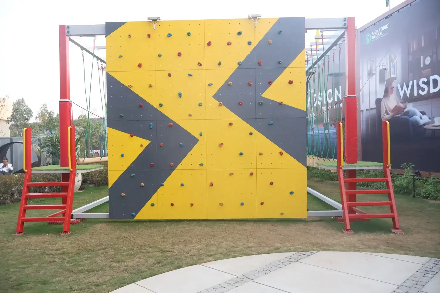 Chevron-panel climbing wall at Signature Global, Gurugram