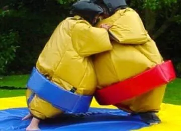 Buy sumo suit online - two wrestlers fighting in Sumo Suit